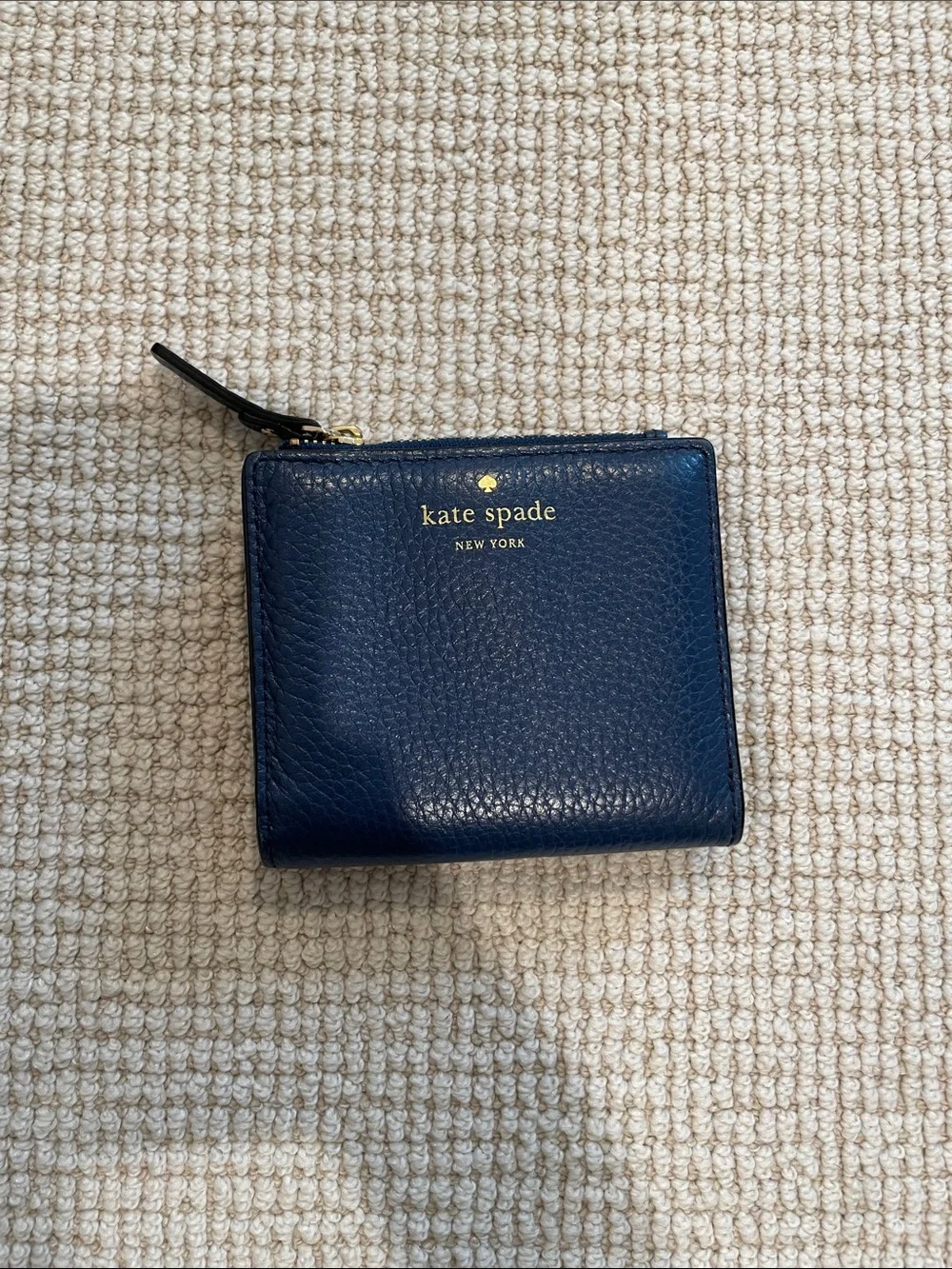 kate spade Pebbled Zip Around Wallet in Deep Blue with Gold Logo